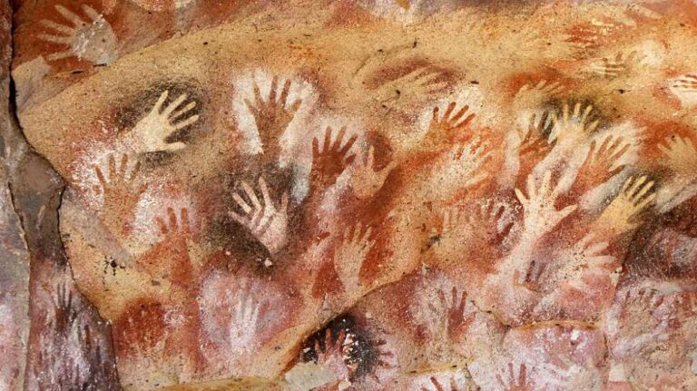 Cueva de las Manos, Public domain, via Wikimedia Commons.