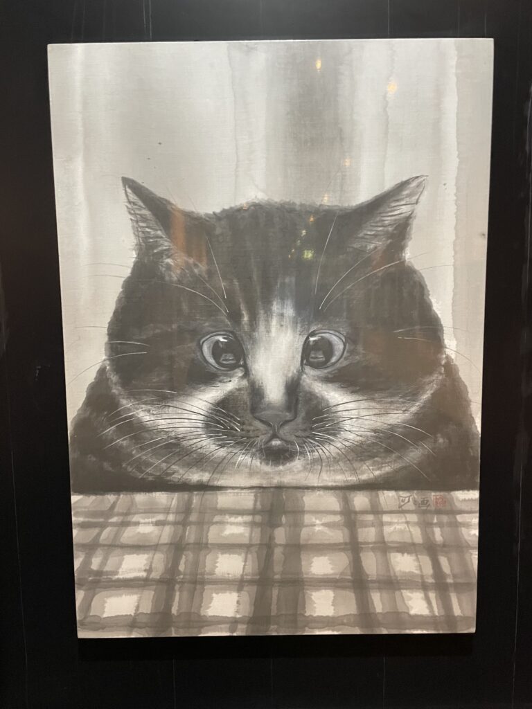 まんまるの目の猫の肖像画