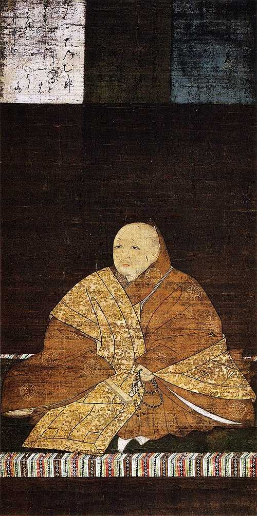 足利義満像。《桃鳩図》には義満の鑑蔵印が残る